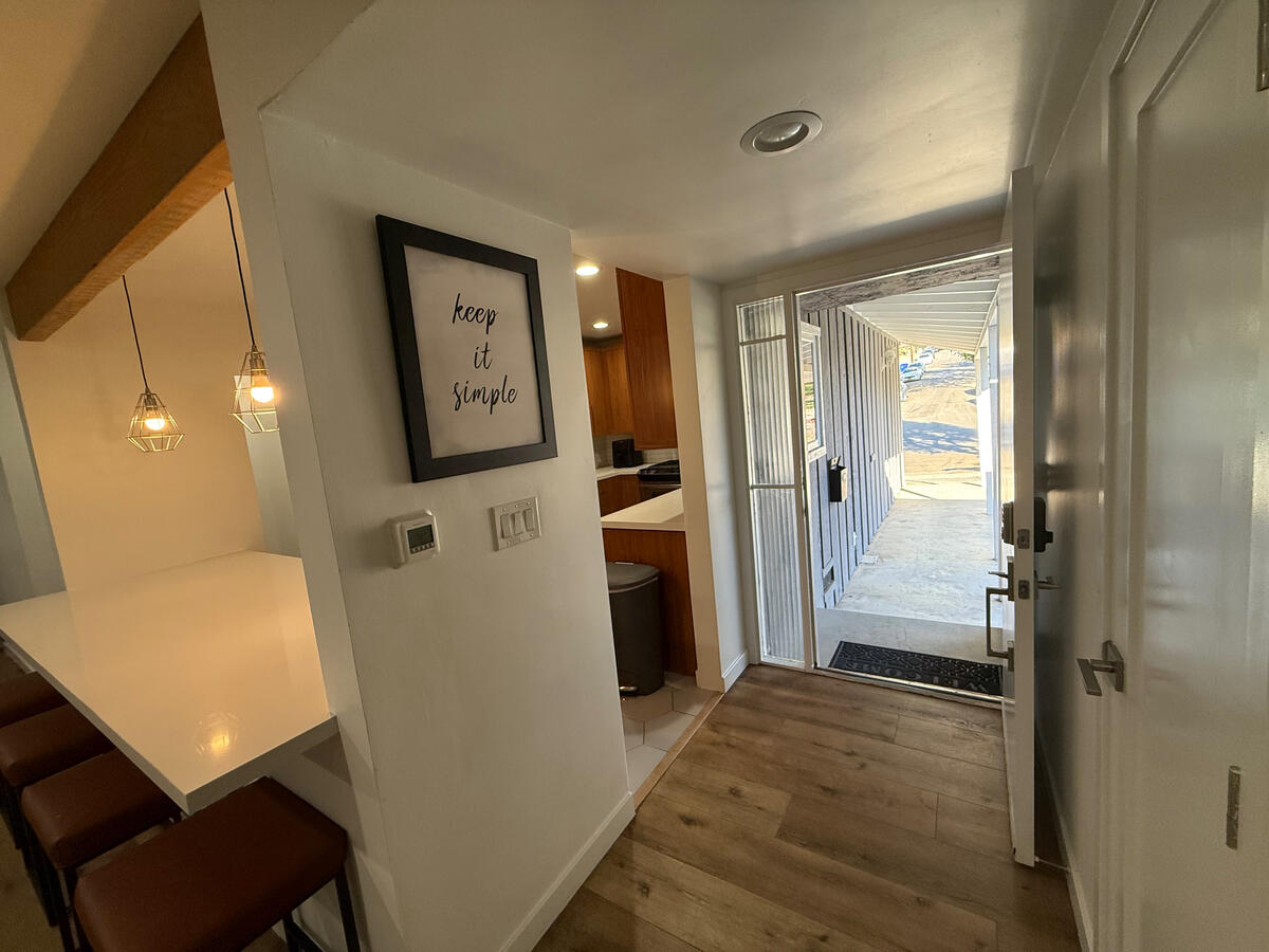 Entry to kitchen and front door at Clean Quarters Inc. Foundation House