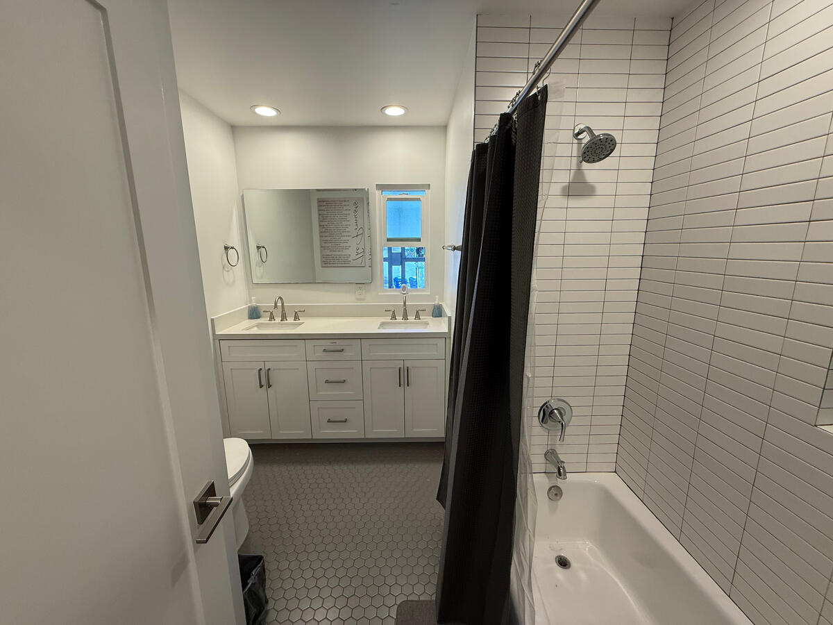 Bathroom # 2 with double sinks at Clean Quarters Inc. Foundation House