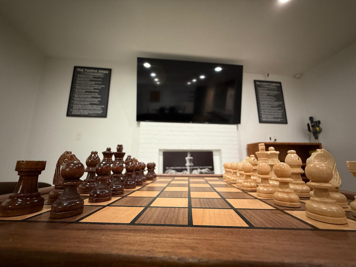 View from our chess board to our 85” Roku TV